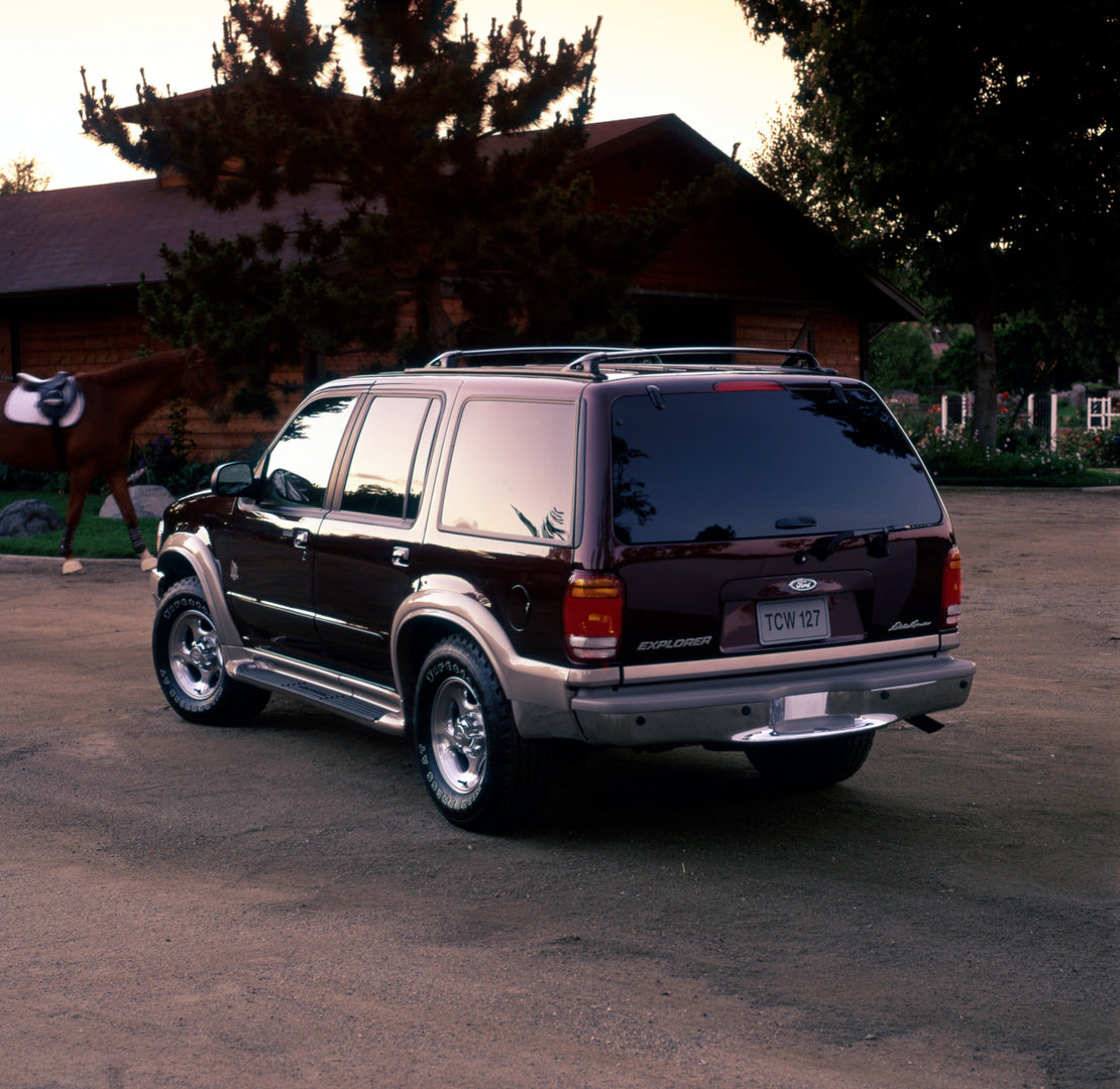This archival image documents the 1999 Ford Explorer Eddie Bauer and is preserved in the Ford Heritage Vault as part of Ford Motor Company's historic photographic archive. Free for personal, non-commercial use. Ford Heritage Vault reference AR-200...