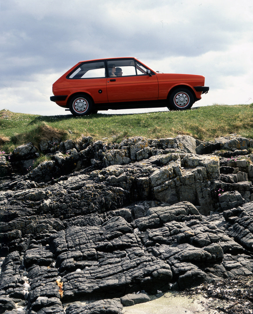 This archival image documents the 1981 Ford Fiesta Mark I RHD side view on scenic rocky bluff and is preserved in the Ford Heritage Vault as part of Ford Motor Company's historic photographic archive. Free for personal, non-commercial use. Ford He...