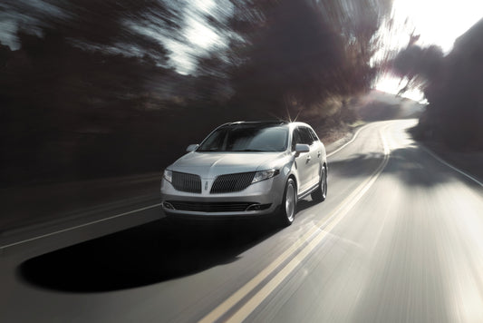 2015 Lincoln MKT action shot on scenic road C4780115 HV 2015-0056