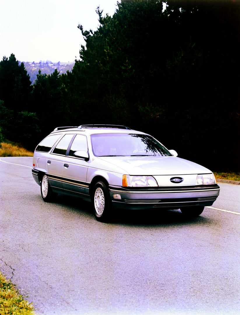 This archival image documents the 1987 Ford Taurus station wagon and is preserved in the Ford Heritage Vault as part of Ford Motor Company's historic photographic archive. Free for personal, non-commercial use. Ford Heritage Vault reference AR-200...
