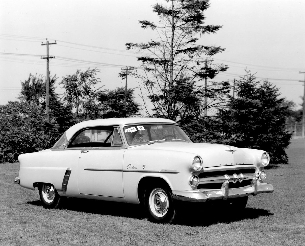 This archival image documents the 1952 Meteor Customline Coupe with scenic trees AR-2007-5 and is preserved in the Ford Heritage Vault as part of Ford Motor Company's historic photographic archive. Free for personal, non-commercial use. Ford Herit...