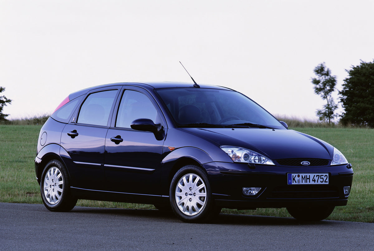 This archival image documents the 2001 Ford Focus closeup on scenic road and is preserved in the Ford Heritage Vault as part of Ford Motor Company's historic photographic archive. Free for personal, non-commercial use. Ford Heritage Vault referenc...
