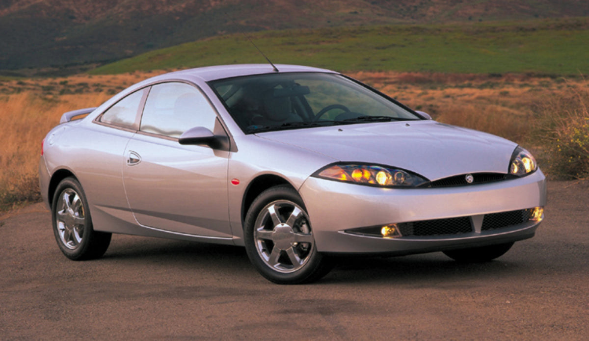 This archival image documents the 1999 Mercury Cougar and is preserved in the Ford Heritage Vault as part of Ford Motor Company's historic photographic archive. Free for personal, non-commercial use. Ford Heritage Vault reference AR-2008-8.1.11.563.