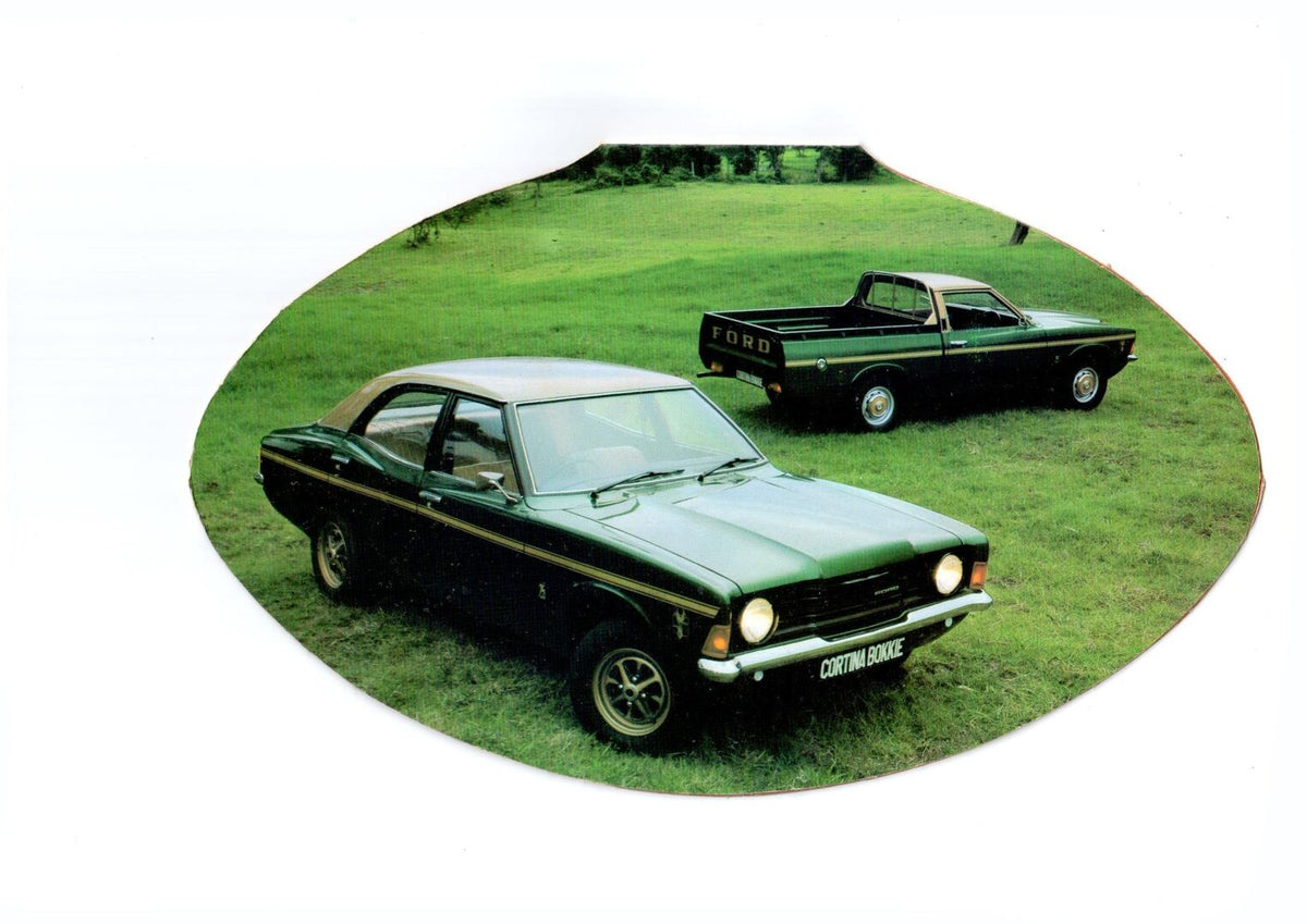 This archival image documents the 1976 Ford Cortina Sedan and Bakkie front and rear view on scenic grass and is preserved in the Ford Heritage Vault as part of Ford Motor Company's historic photographic archive. Free for personal, non-commercial u...
