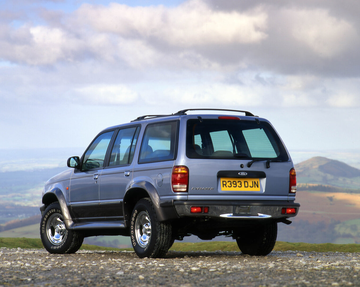This archival image documents the 1998 Ford Explorer rear 3/4 view scenic and is preserved in the Ford Heritage Vault as part of Ford Motor Company's historic photographic archive. Free for personal, non-commercial use. Ford Heritage Vault referen...