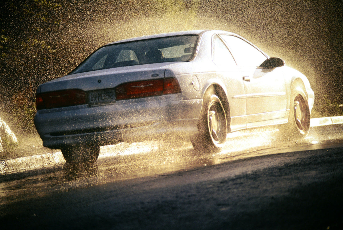 This archival image documents the 1994 Ford Thunderbird two-door and is preserved in the Ford Heritage Vault as part of Ford Motor Company's historic photographic archive. Free for personal, non-commercial use. Ford Heritage Vault reference AR-200...