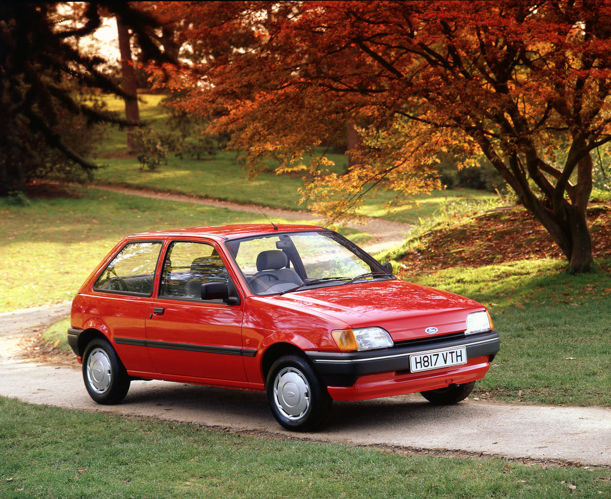 This archival image documents the 1990 Ford Fiesta Mark III Popular Plus on scenic path with autumn trees and is preserved in the Ford Heritage Vault as part of Ford Motor Company's historic photographic archive. Free for personal, non-commercial ...