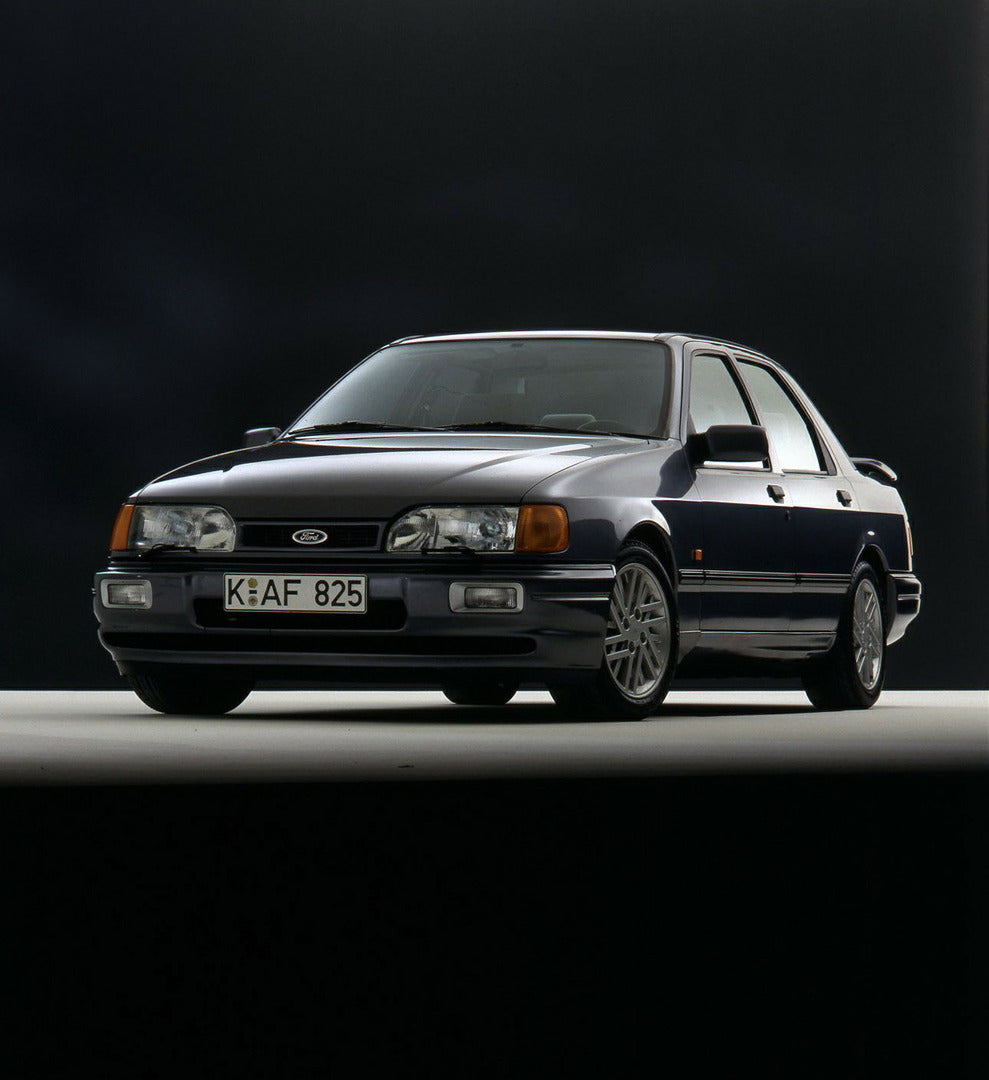 This archival image documents the 1987 Ford Sierra RS Cosworth Sapphire low view in Kubiseh Studio and is preserved in the Ford Heritage Vault as part of Ford Motor Company's historic photographic archive. Free for personal, non-commercial use. Fo...