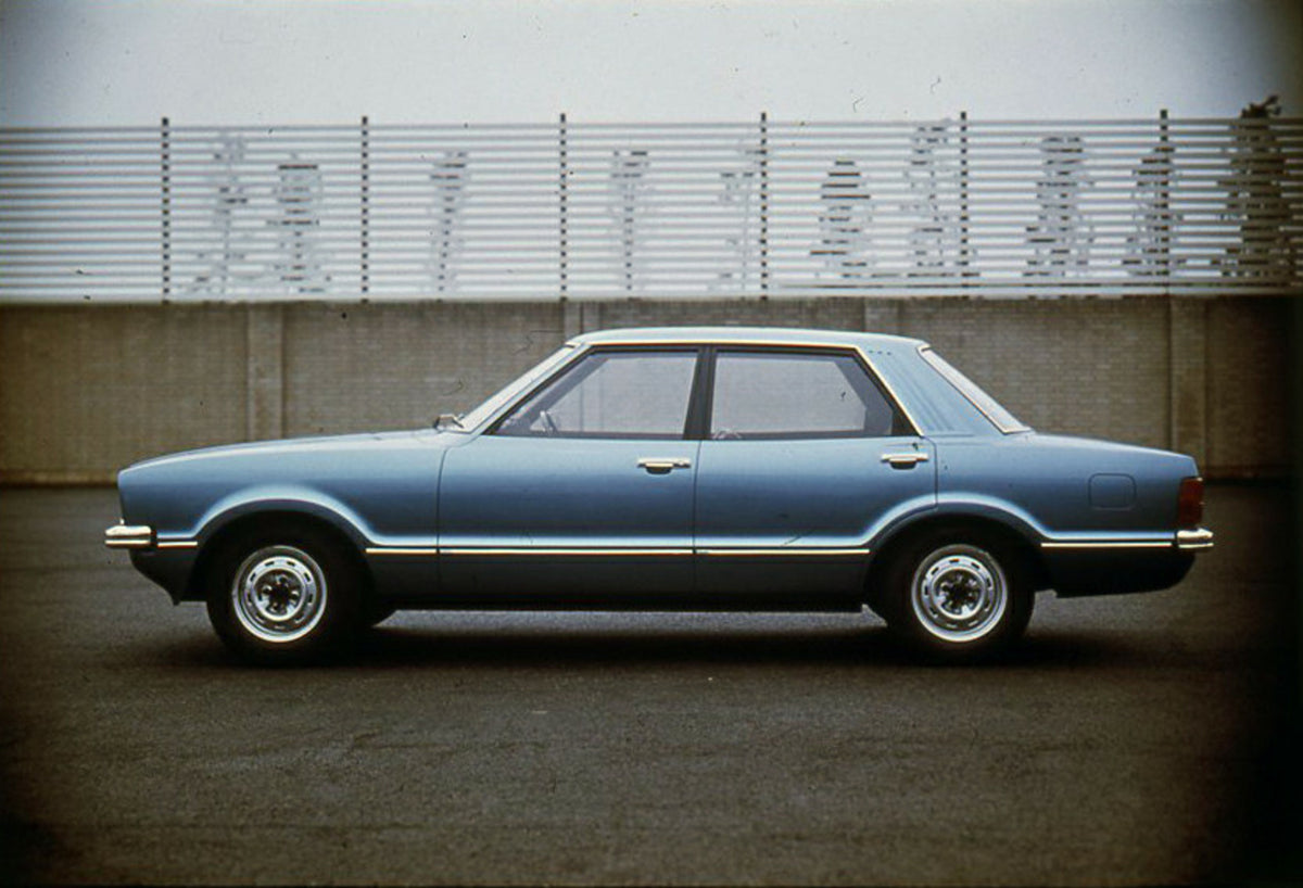 This archival image documents the 1976 Ford Taunus side view with cement wall and is preserved in the Ford Heritage Vault as part of Ford Motor Company's historic photographic archive. Free for personal, non-commercial use. Ford Heritage Vault ref...