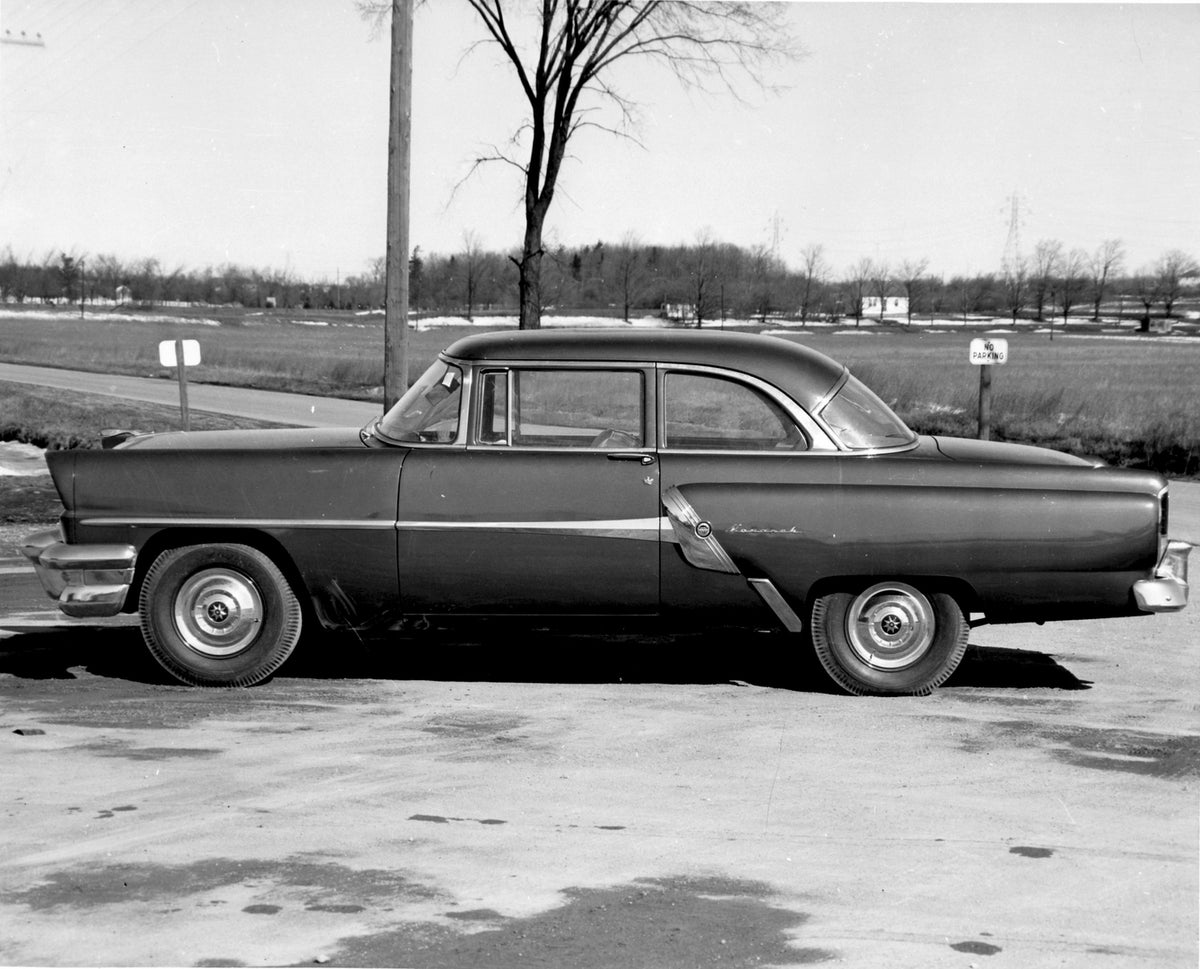 This archival image documents the 1955 Monarch Lucerne Coupe side view on scenic road AR-2007-5 and is preserved in the Ford Heritage Vault as part of Ford Motor Company's historic photographic archive. Free for personal, non-commercial use. Ford ...