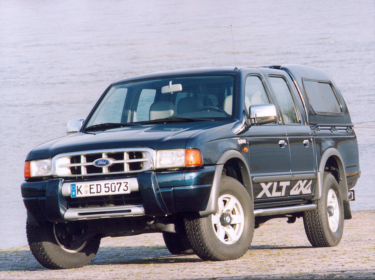 This archival image documents the 2001 Ford Ranger XLT closeup on scenic beach and is preserved in the Ford Heritage Vault as part of Ford Motor Company's historic photographic archive. Free for personal, non-commercial use. Ford Heritage Vault re...
