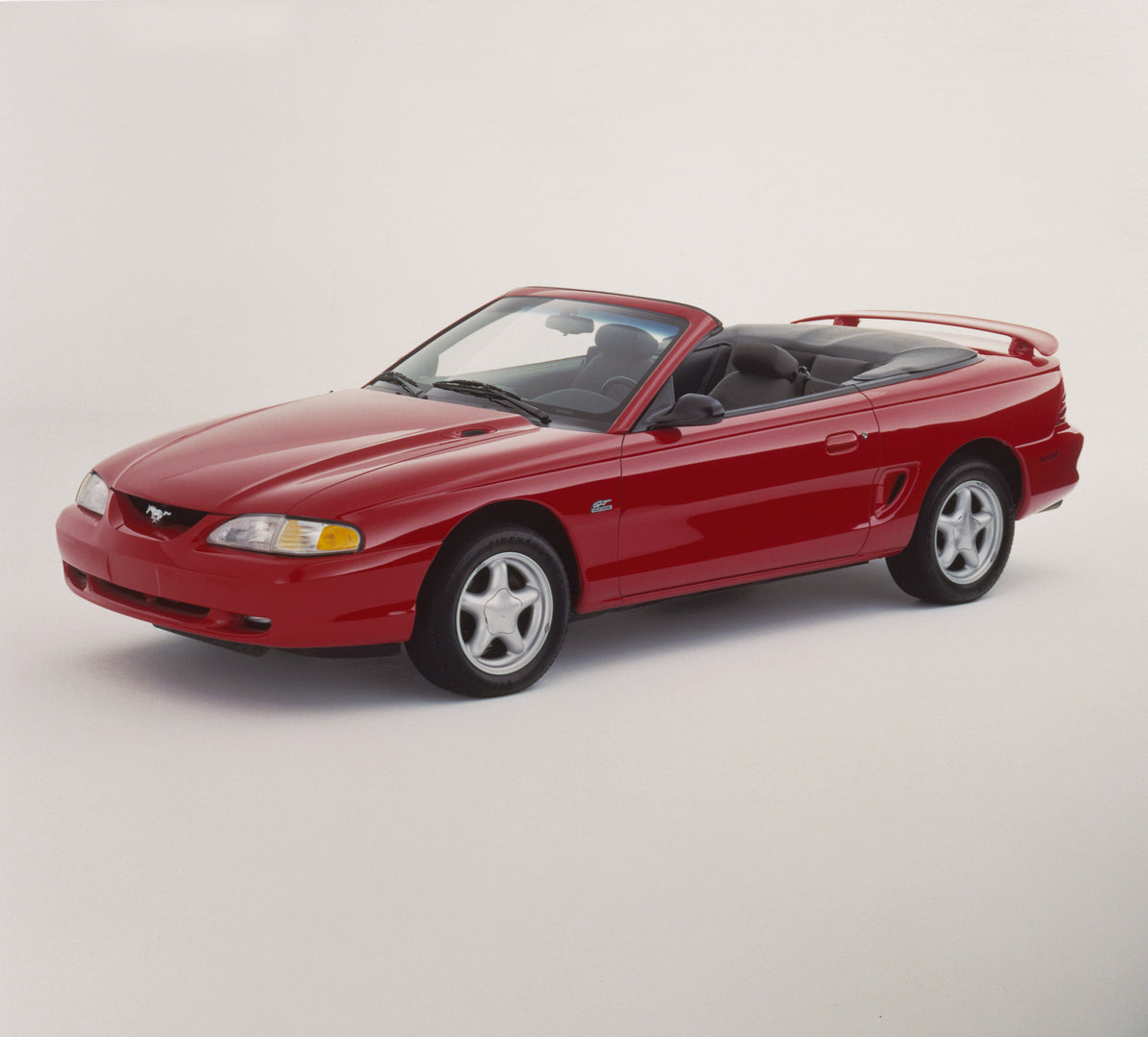 This archival image documents the 1994 Ford Mustang GT convertible and is preserved in the Ford Heritage Vault as part of Ford Motor Company's historic photographic archive. Free for personal, non-commercial use. Ford Heritage Vault reference AR-2...