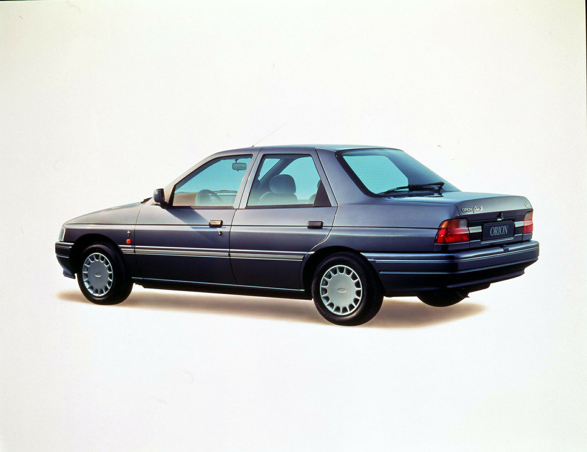 This archival image documents the 1990 Ford Orion Mark III rear view in studio and is preserved in the Ford Heritage Vault as part of Ford Motor Company's historic photographic archive. Free for personal, non-commercial use. Ford Heritage Vault re...