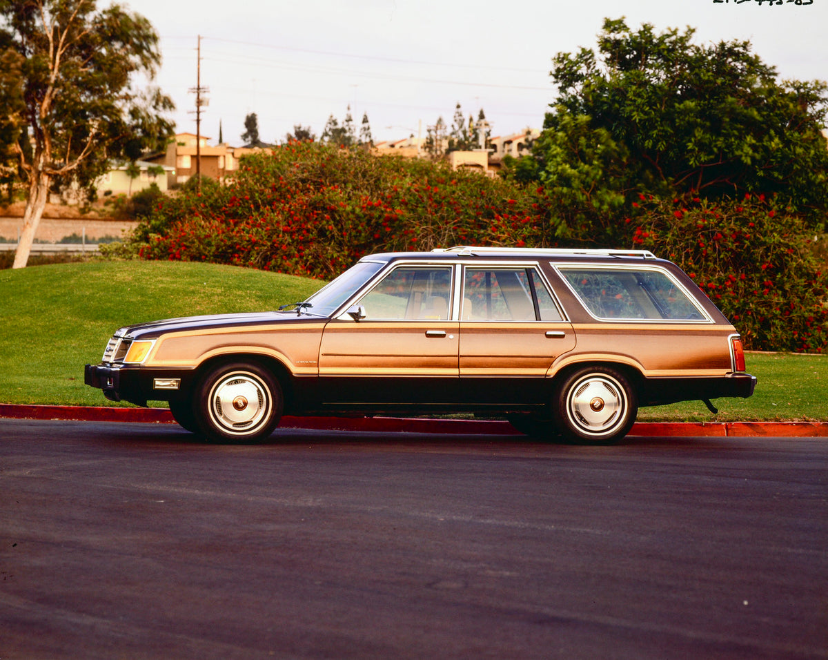 This archival image documents the 1985 Ford Country Squire and is preserved in the Ford Heritage Vault as part of Ford Motor Company's historic photographic archive. Free for personal, non-commercial use. Ford Heritage Vault reference AR-2001-88-1...