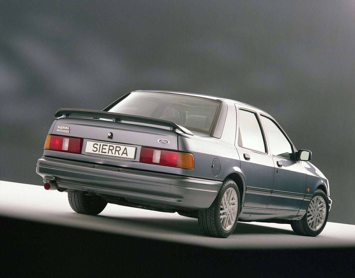 This archival image documents the 1987 Ford Sierra RS Cosworth Sapphire rear view in Kubiseh Studio and is preserved in the Ford Heritage Vault as part of Ford Motor Company's historic photographic archive. Free for personal, non-commercial use. F...
