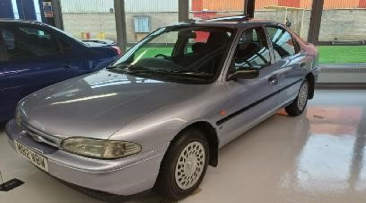This archival image documents the 1995 Ford Mondeo Mk I 1.8L LX and is preserved in the Ford Heritage Vault as part of Ford Motor Company's historic photographic archive. Free for personal, non-commercial use. Ford Heritage Vault reference AR-2024...