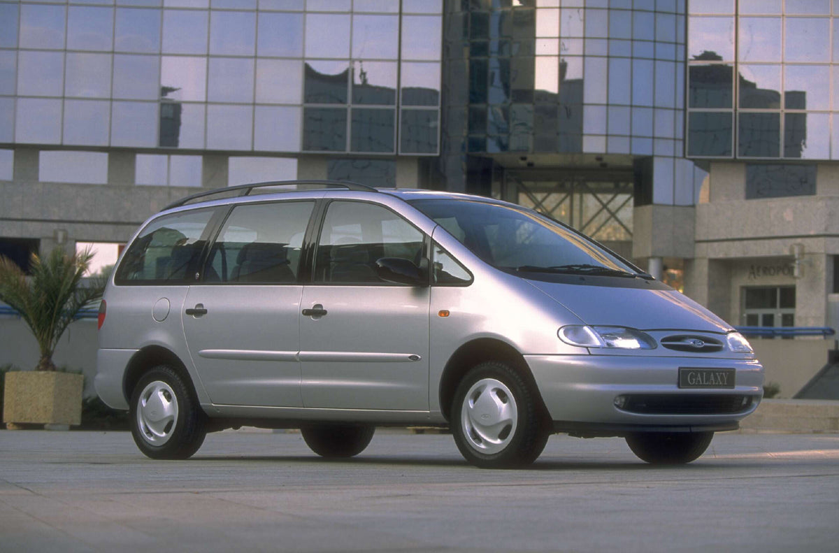 This archival image documents the 1994 Ford Galaxy Mark I Ghia in front of glass building AR-2002-213709 and is preserved in the Ford Heritage Vault as part of Ford Motor Company's historic photographic archive. Free for personal, non-commercial u...