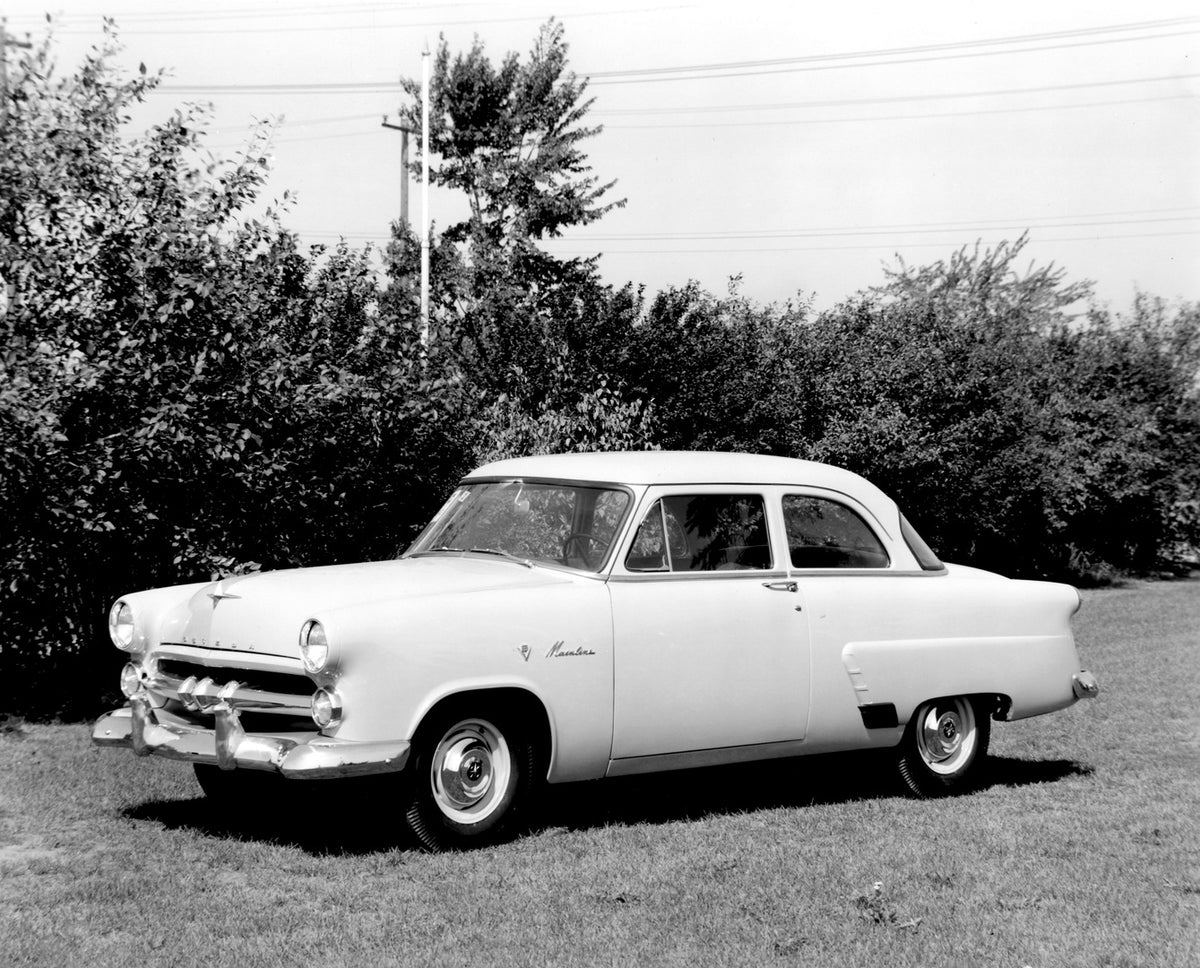 This archival image documents the 1952 Meteor Customline Coupe with scenic trees AR-2007-5 and is preserved in the Ford Heritage Vault as part of Ford Motor Company's historic photographic archive. Free for personal, non-commercial use. Ford Herit...