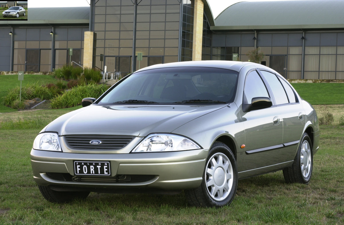 This archival image documents the 1998 Ford Falcon Forte on grass in front of building DSC_0014 and is preserved in the Ford Heritage Vault as part of Ford Motor Company's historic photographic archive. Free for personal, non-commercial use. Ford ...