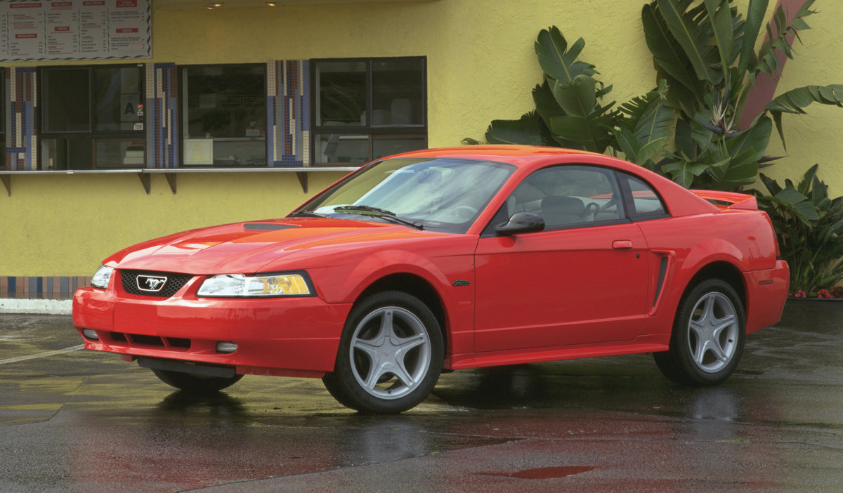 This archival image documents the 2000 Ford Mustang GT coupe and is preserved in the Ford Heritage Vault as part of Ford Motor Company's historic photographic archive. Free for personal, non-commercial use. Ford Heritage Vault reference AR-2008-8....