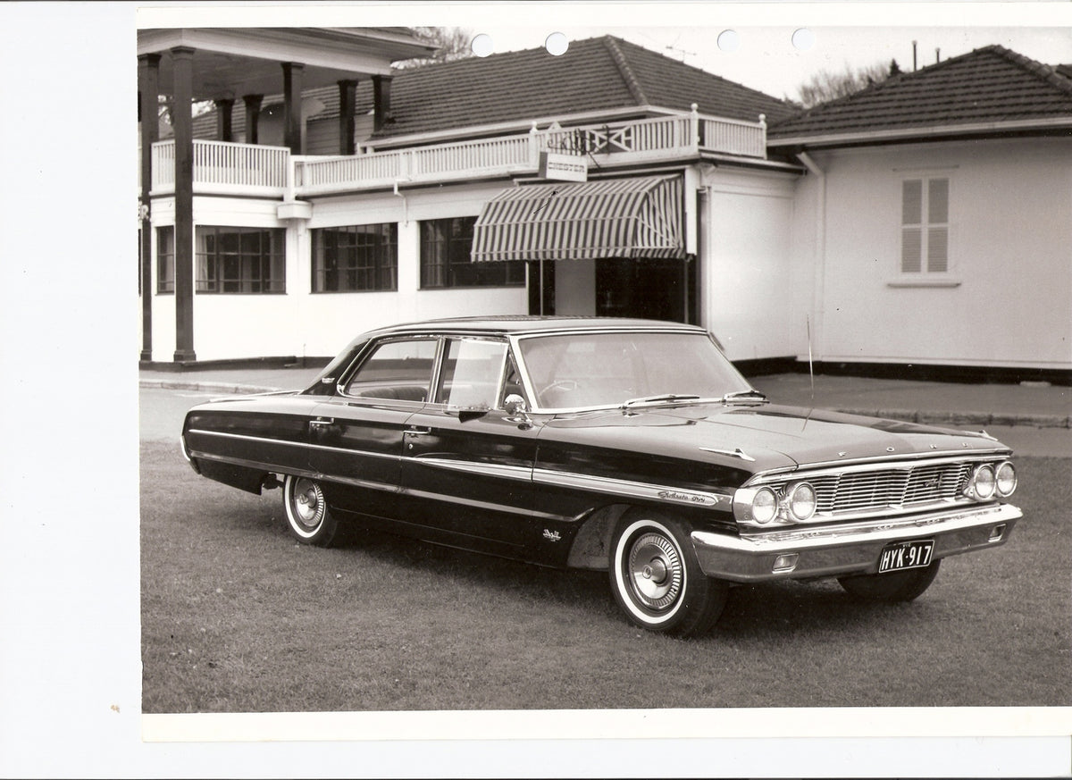 This archival image documents the 1964 Ford Galaxie 500 in front of scenic building and is preserved in the Ford Heritage Vault as part of Ford Motor Company's historic photographic archive. Free for personal, non-commercial use. Ford Heritage Vau...