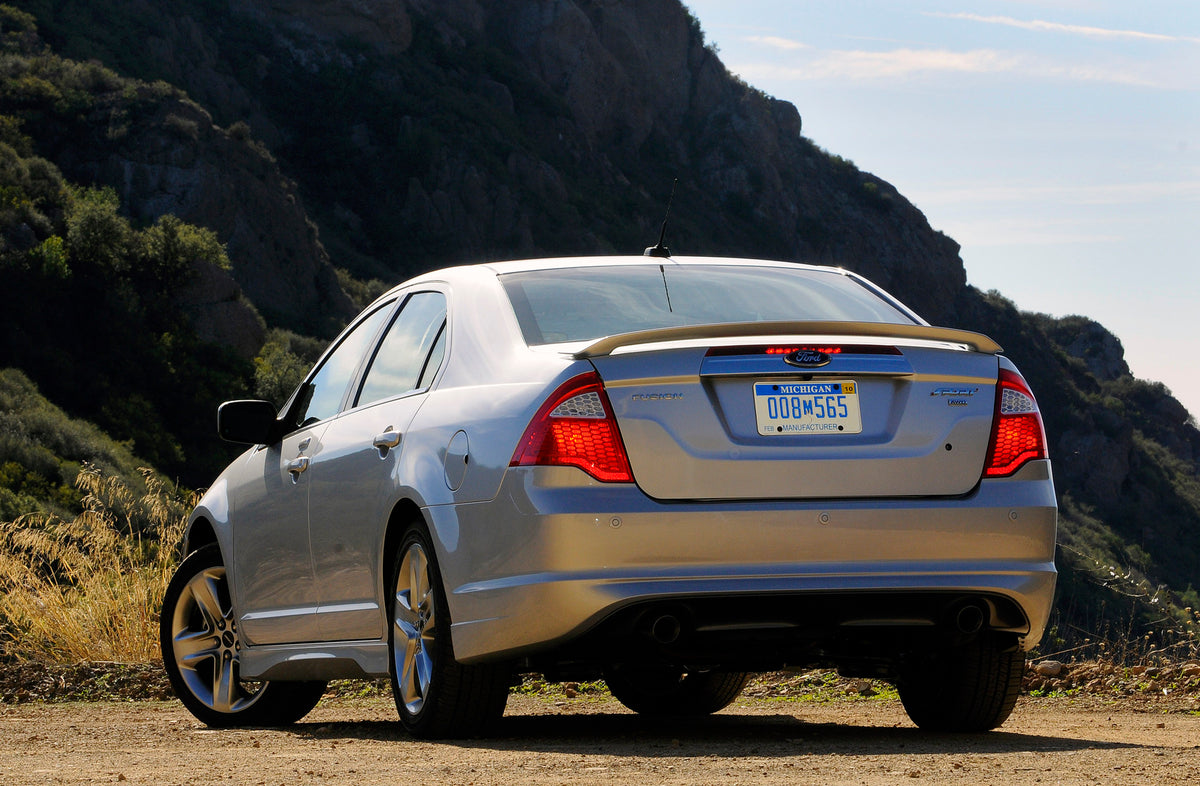 This archival image documents the 2010 Ford Fusion scenic mountains and is preserved in the Ford Heritage Vault as part of Ford Motor Company's historic photographic archive. Free for personal, non-commercial use. Ford Heritage Vault reference AR-...