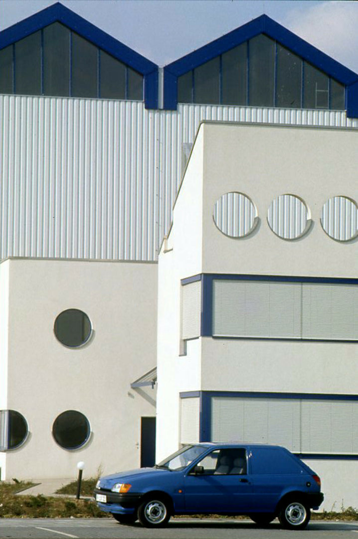 This archival image documents the 1989 Ford Fiesta Mark III Van side view in front of building and is preserved in the Ford Heritage Vault as part of Ford Motor Company's historic photographic archive. Free for personal, non-commercial use. Ford H...