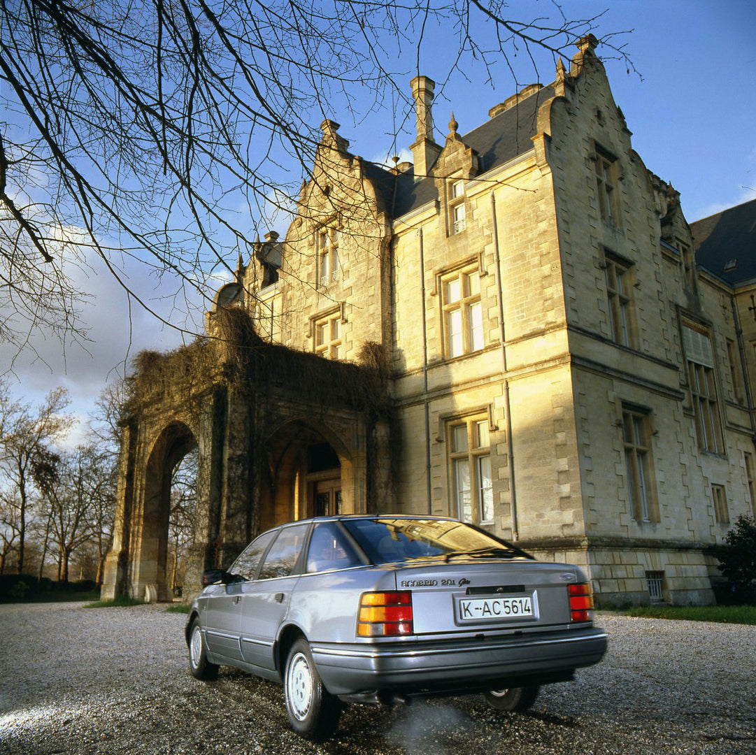This archival image documents the 1985 Ford Scorpio Mark I rear view in front of scenic building in Bordeaux and is preserved in the Ford Heritage Vault as part of Ford Motor Company's historic photographic archive. Free for personal, non-commerci...
