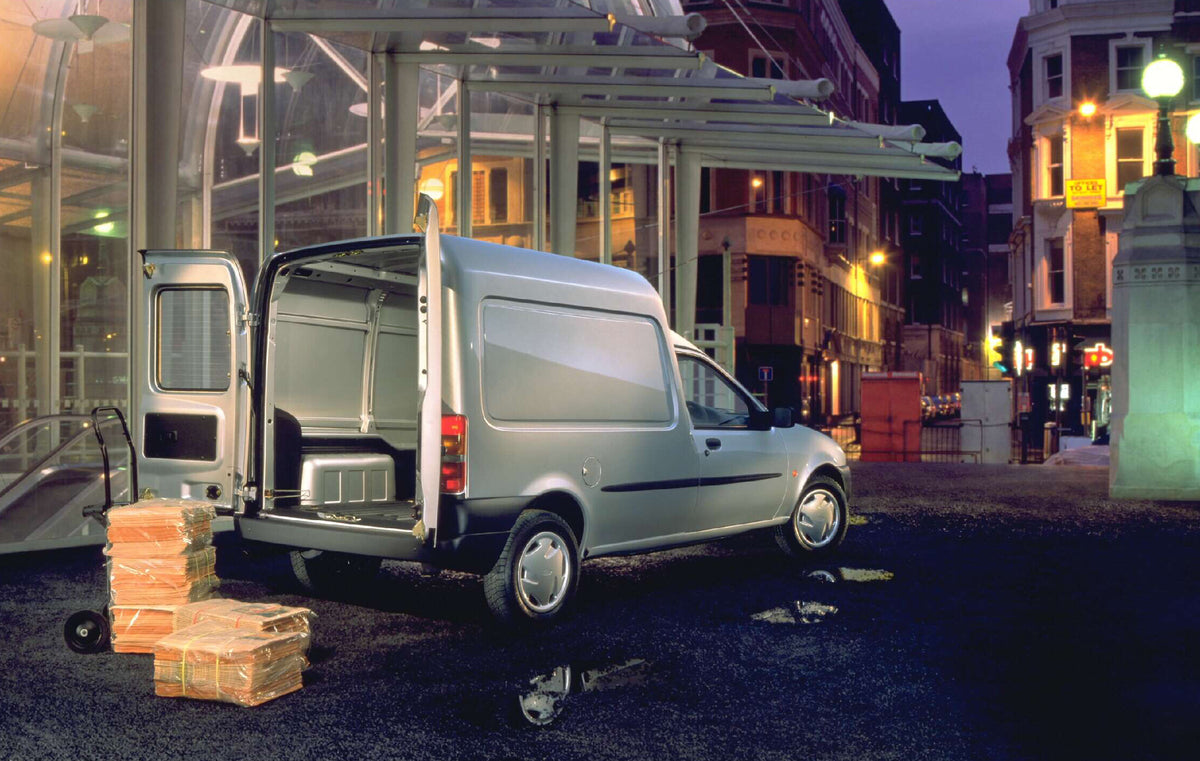 This archival image documents the 1996 Ford Fiesta Mark IV Courier 50 Van rear view with open doors in city AR-2002-213709 and is preserved in the Ford Heritage Vault as part of Ford Motor Company's historic photographic archive. Free for personal...