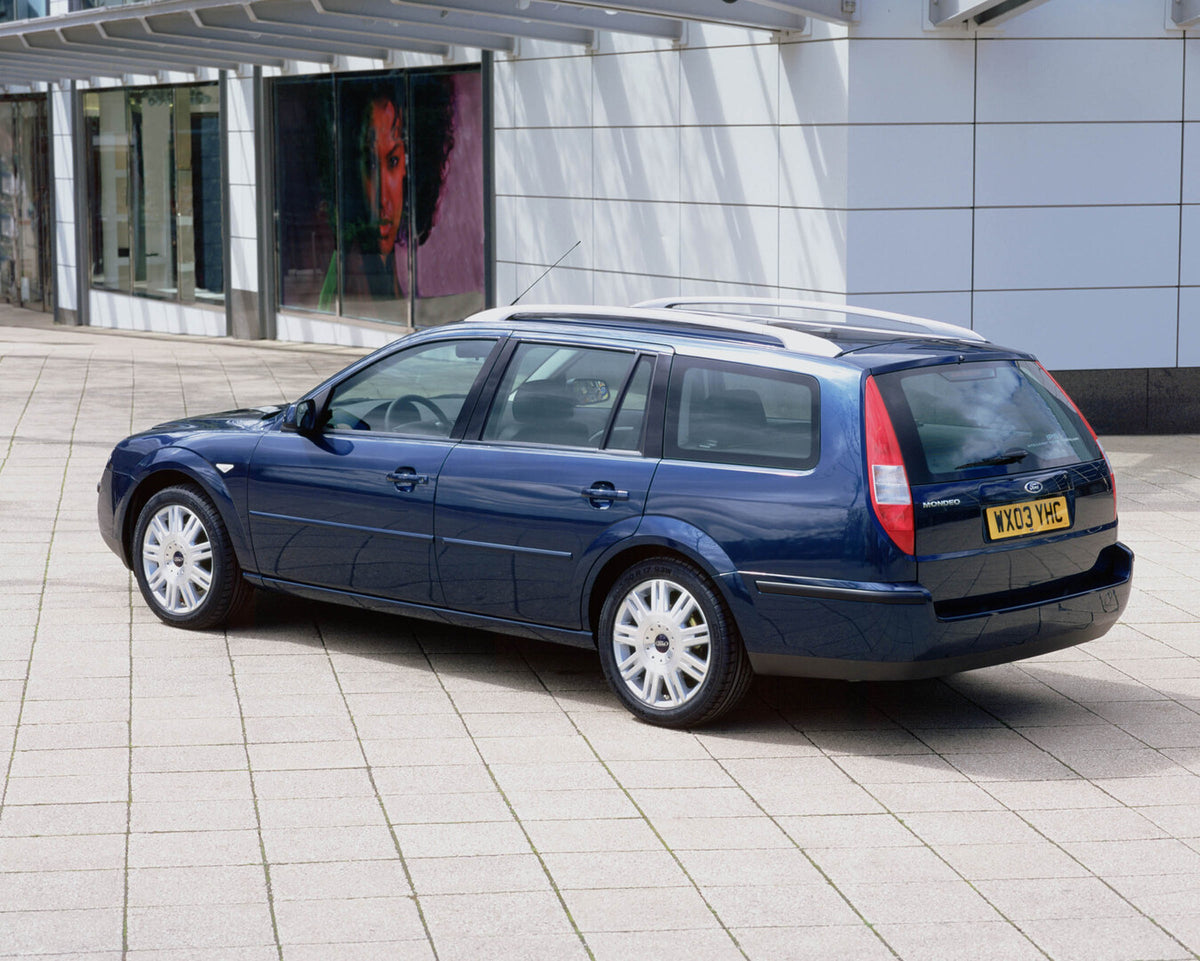 This archival image documents the 2003 Ford Mondeo Mark II rear view in front of scenic building and is preserved in the Ford Heritage Vault as part of Ford Motor Company's historic photographic archive. Free for personal, non-commercial use. Ford...