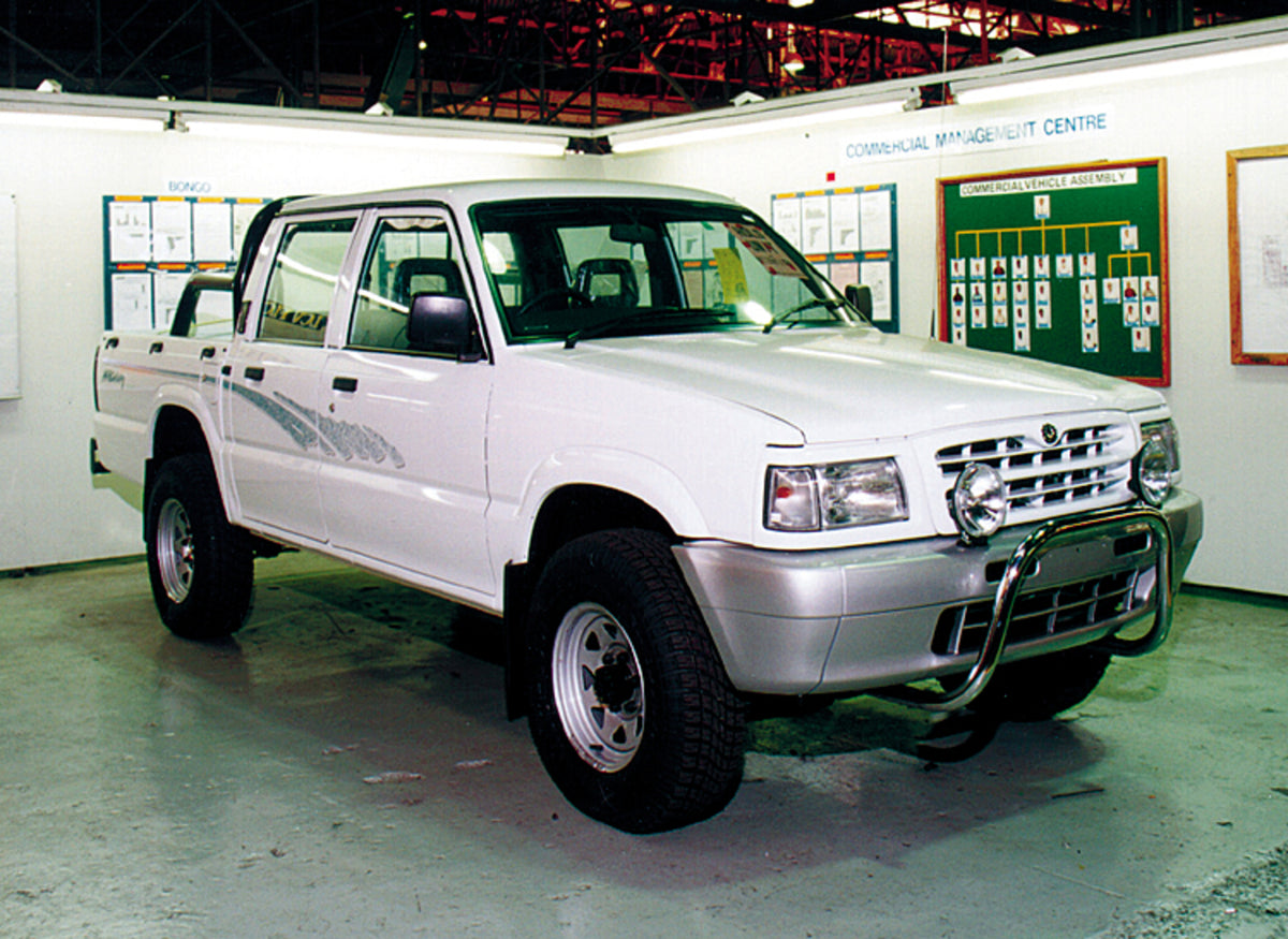 This archival image documents the 1999 Ford Courier Truck inside of building and is preserved in the Ford Heritage Vault as part of Ford Motor Company's historic photographic archive. Free for personal, non-commercial use. Ford Heritage Vault refe...
