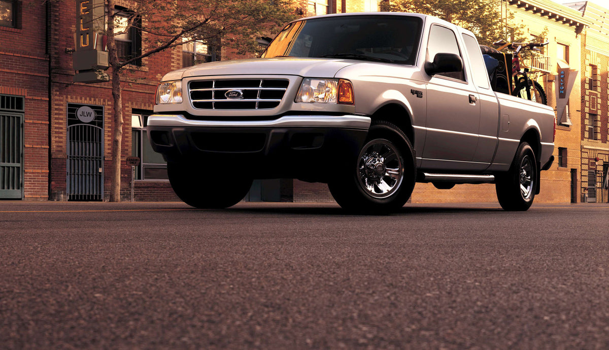 This archival image documents the 2003 Ford Ranger XLT on scenic city street and is preserved in the Ford Heritage Vault as part of Ford Motor Company's historic photographic archive. Free for personal, non-commercial use. Ford Heritage Vault refe...