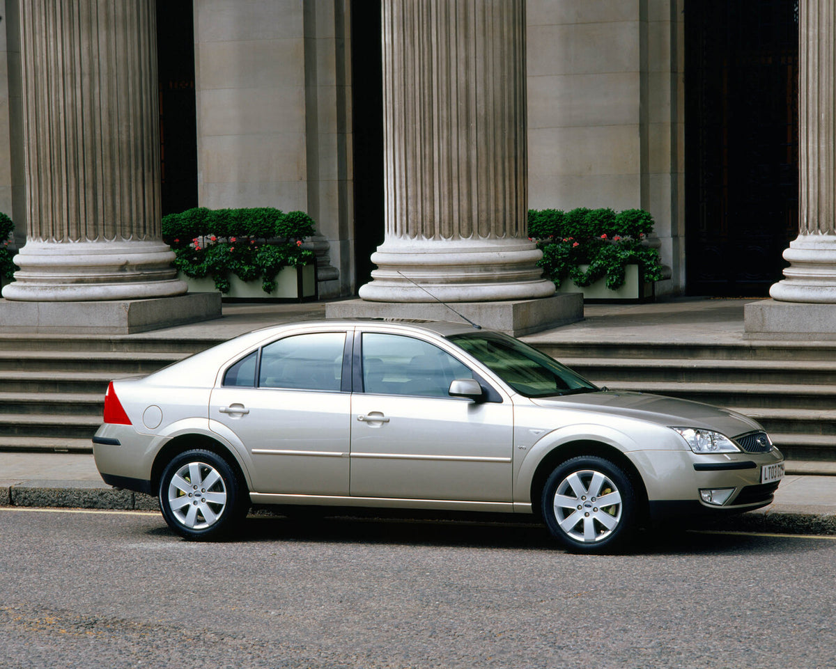 This archival image documents the 2003 Ford Mondeo Mark II side view in front of scenic pillars and is preserved in the Ford Heritage Vault as part of Ford Motor Company's historic photographic archive. Free for personal, non-commercial use. Ford ...