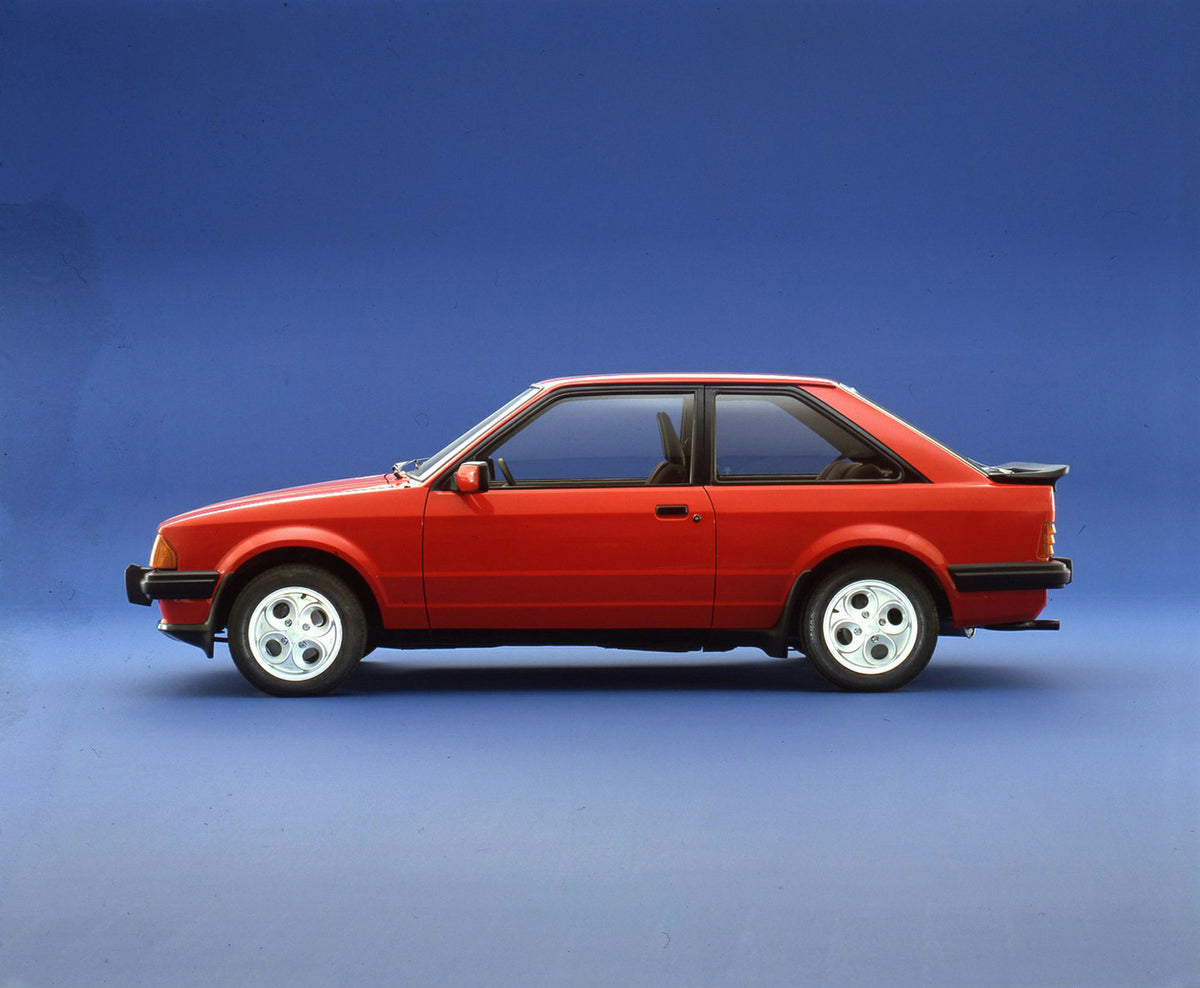 This archival image documents the 1980 Ford Escort Mark III LHD in studio and is preserved in the Ford Heritage Vault as part of Ford Motor Company's historic photographic archive. Free for personal, non-commercial use. Ford Heritage Vault referen...