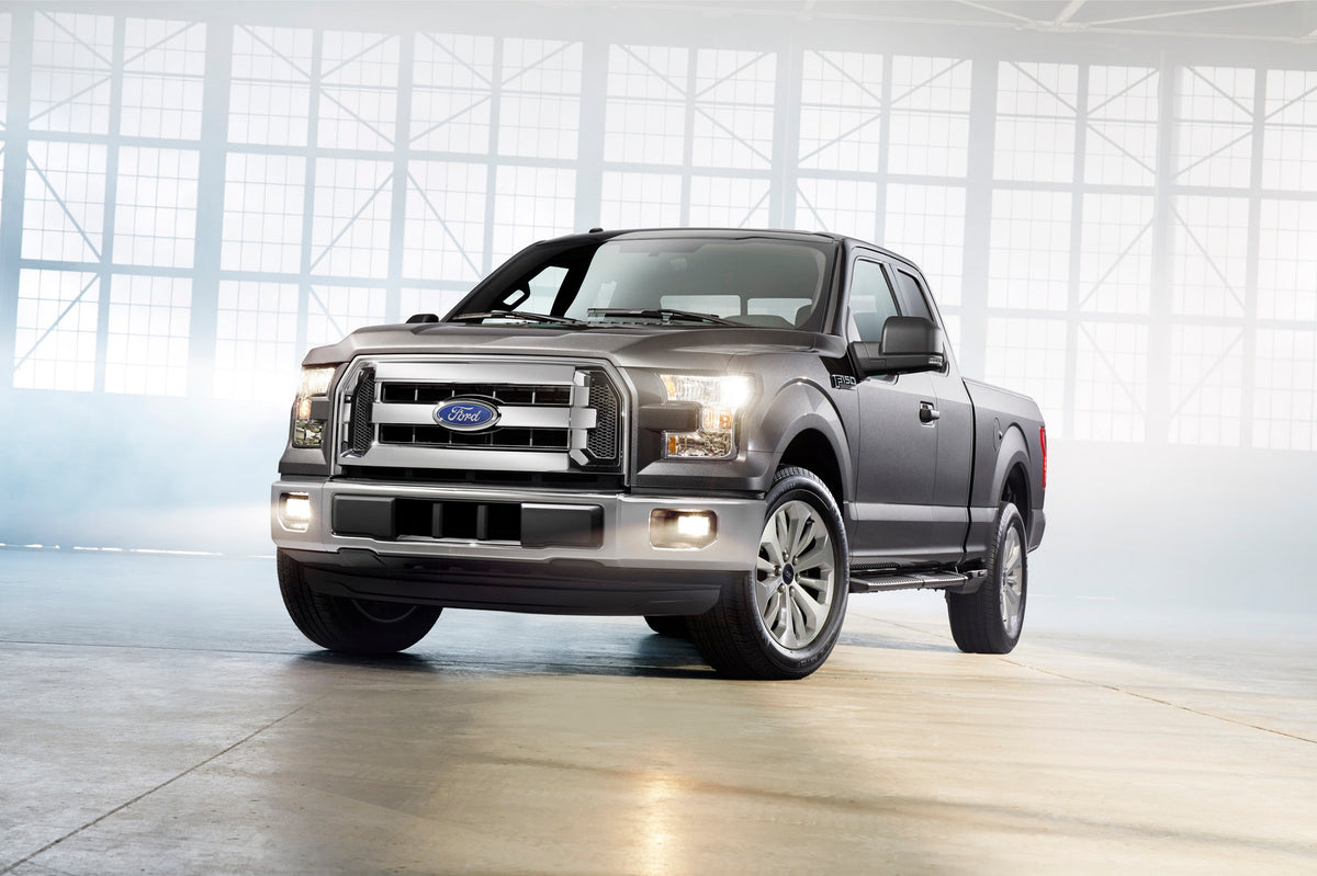 This archival image documents the 2014 Ford F-150 foggy industrial setting and is preserved in the Ford Heritage Vault as part of Ford Motor Company's historic photographic archive. Free for personal, non-commercial use. Ford Heritage Vault refere...