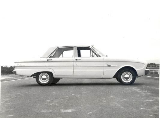 1962 Ford XL Falcon side view on scenic road HV 1962-0094