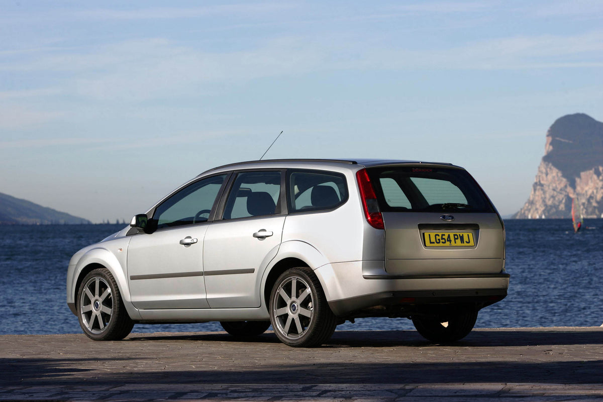 This archival image documents the 2000 Ford Focus rear view with scenic ocean MS10389 and is preserved in the Ford Heritage Vault as part of Ford Motor Company's historic photographic archive. Free for personal, non-commercial use. Ford Heritage V...
