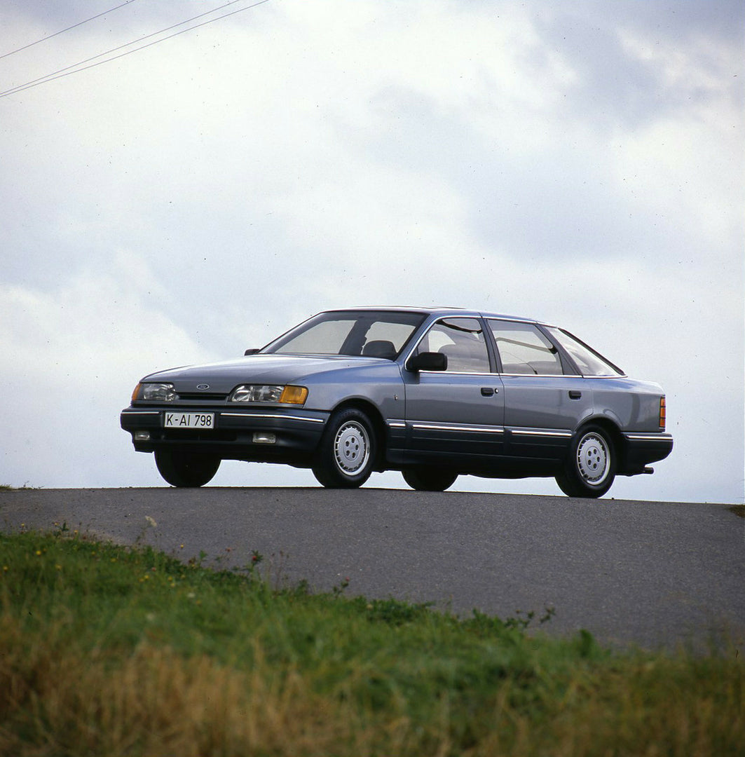 This archival image documents the 1985 Ford Scorpio Mark I Ghia on road and is preserved in the Ford Heritage Vault as part of Ford Motor Company's historic photographic archive. Free for personal, non-commercial use. Ford Heritage Vault reference...