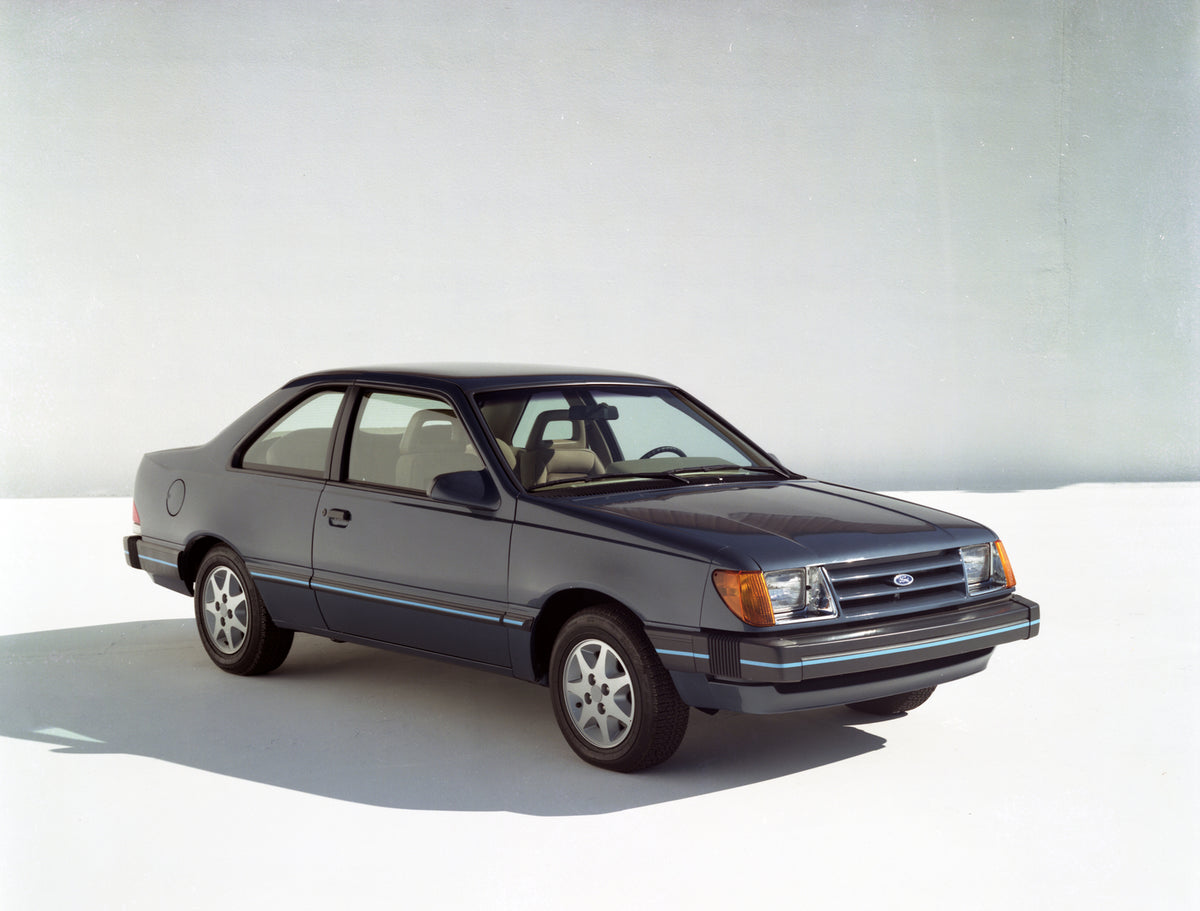 This archival image documents the 1985 Ford Tempo L and is preserved in the Ford Heritage Vault as part of Ford Motor Company's historic photographic archive. Free for personal, non-commercial use. Ford Heritage Vault reference AR-2008-8.1.2.7198.