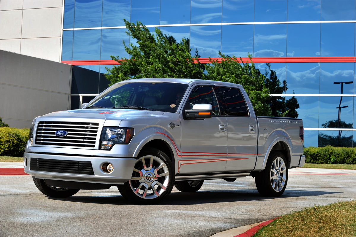 This archival image documents the 2011 Ford F-150 in front of glass building and is preserved in the Ford Heritage Vault as part of Ford Motor Company's historic photographic archive. Free for personal, non-commercial use. Ford Heritage Vault refe...