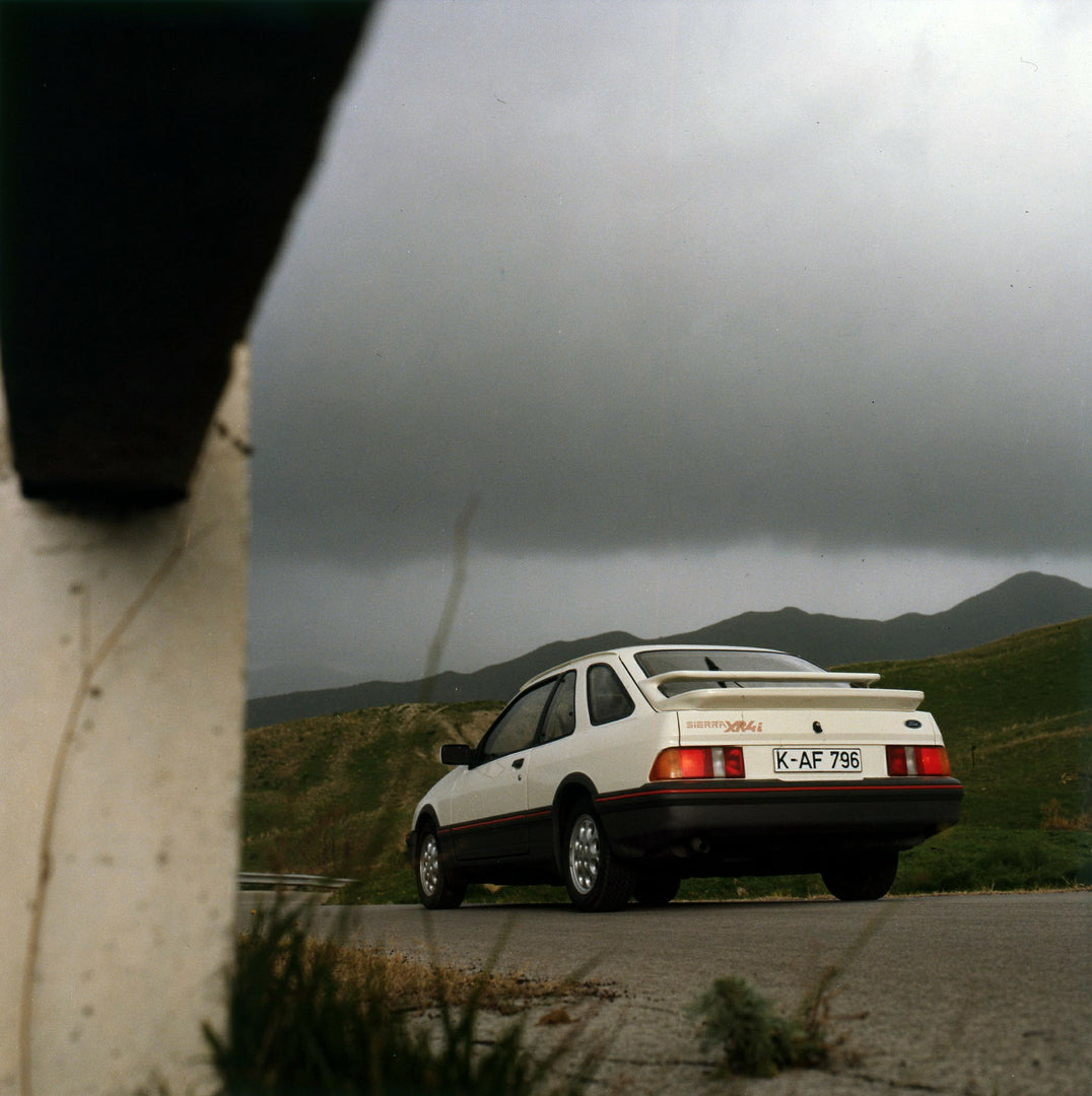 This archival image documents the 1983 Ford Sierra XR4i Mark I on road in Sicily and is preserved in the Ford Heritage Vault as part of Ford Motor Company's historic photographic archive. Free for personal, non-commercial use. Ford Heritage Vault ...