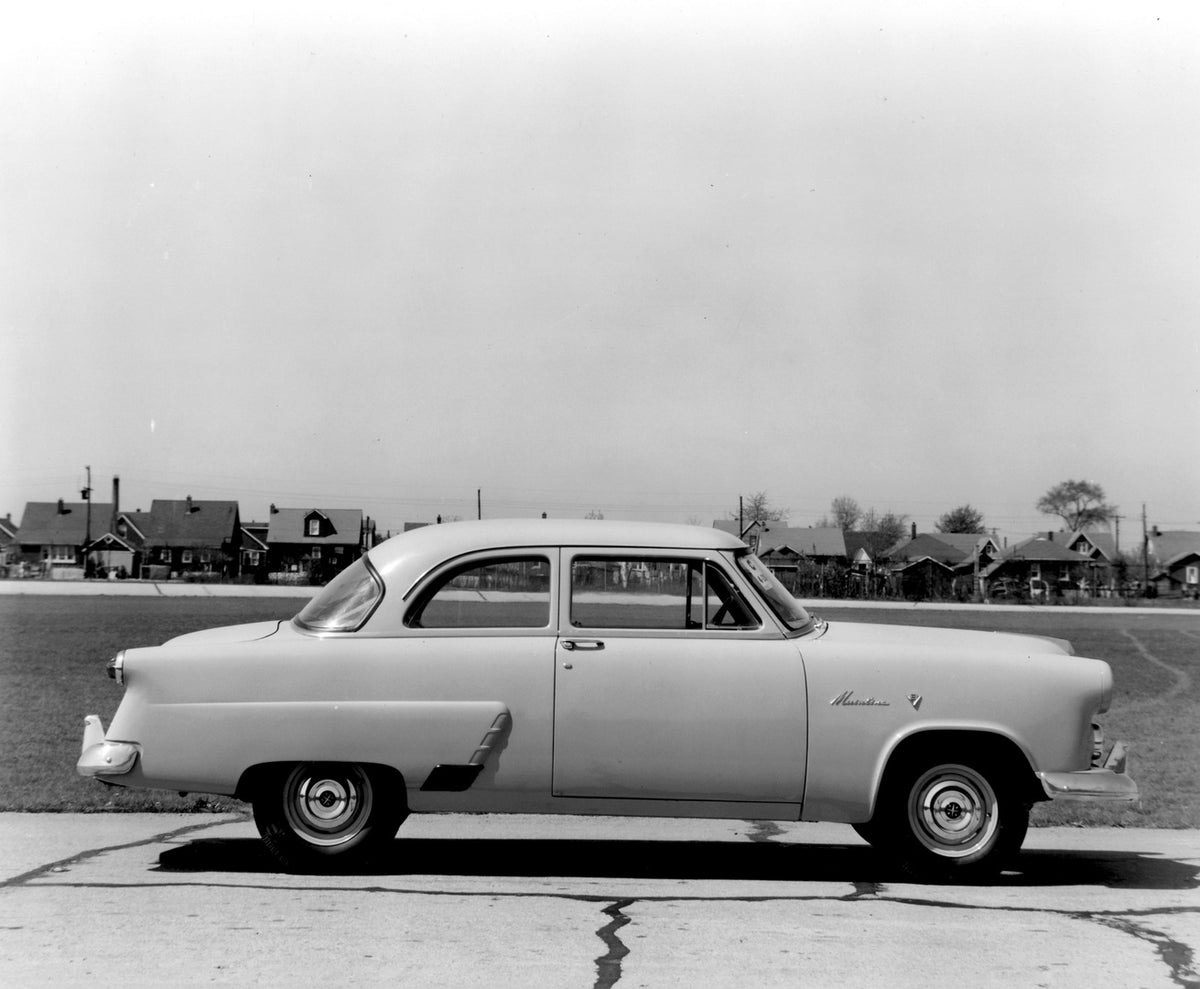 This archival image documents the 1952 Meteor Mainline Coupe side view on road with houses AR-2007-5 and is preserved in the Ford Heritage Vault as part of Ford Motor Company's historic photographic archive. Free for personal, non-commercial use. ...