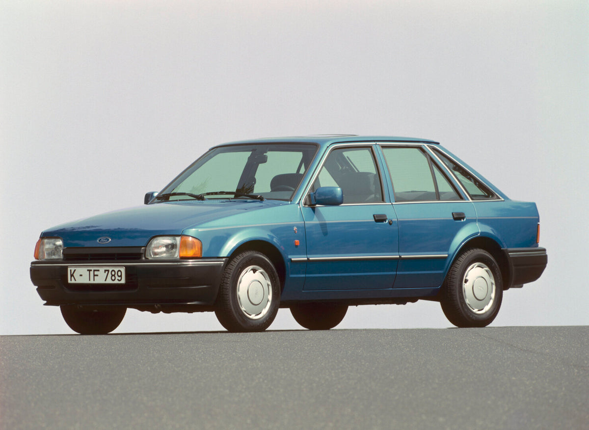 This archival image documents the 1990 Ford Escort Mark IV with scenic blue sky escort-1-6-ghia-1990-01mags and is preserved in the Ford Heritage Vault as part of Ford Motor Company's historic photographic archive. Free for personal, non-commercia...