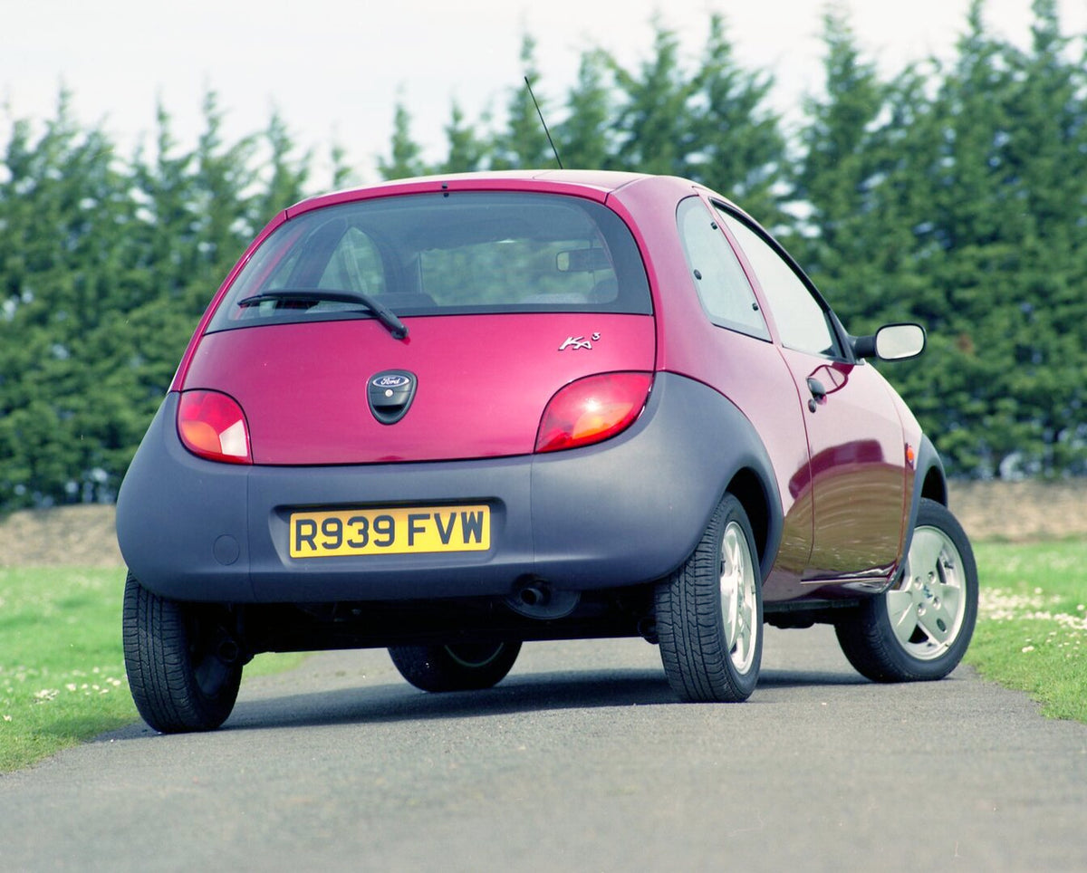 This archival image documents the 1998 Ford Ka 3 rear view on scenic road and is preserved in the Ford Heritage Vault as part of Ford Motor Company's historic photographic archive. Free for personal, non-commercial use. Ford Heritage Vault referen...