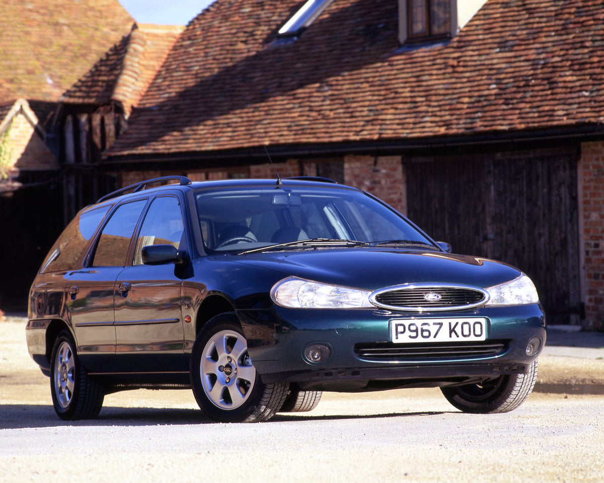 This archival image documents the 1996 Ford Mondeo Mark I Ghia X Estate in front of scenic brick building and is preserved in the Ford Heritage Vault as part of Ford Motor Company's historic photographic archive. Free for personal, non-commercial ...