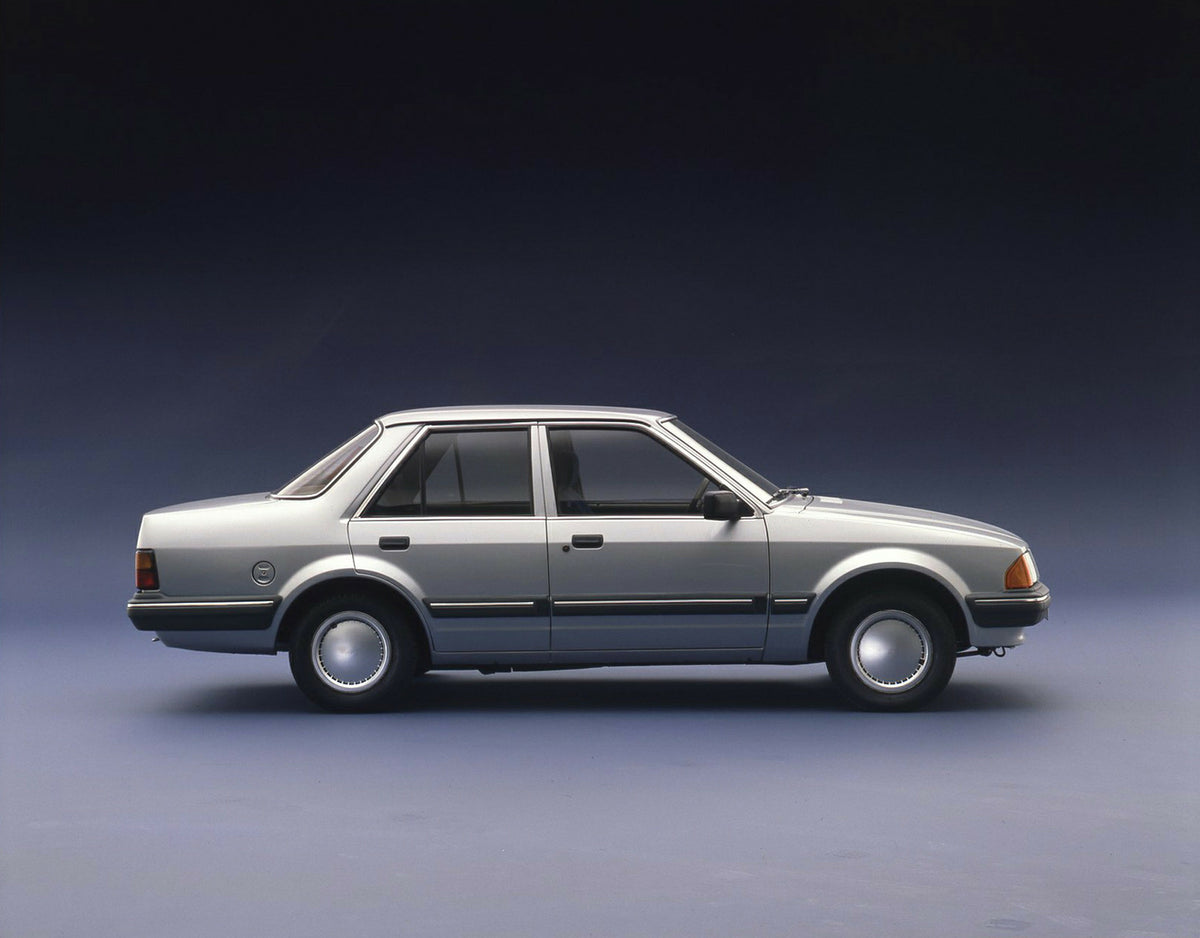 This archival image documents the 1983 Ford Orion GL side view in studio and is preserved in the Ford Heritage Vault as part of Ford Motor Company's historic photographic archive. Free for personal, non-commercial use. Ford Heritage Vault referenc...