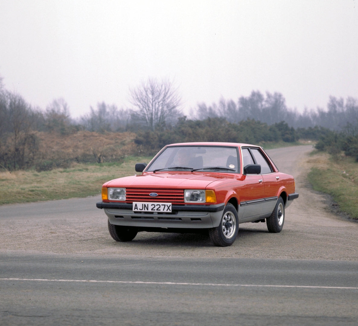 This archival image documents the 1982 Ford Cortina Crusader Mark V on scenic road 1982 MKV Cortina Crusader and is preserved in the Ford Heritage Vault as part of Ford Motor Company's historic photographic archive. Free for personal, non-commerci...