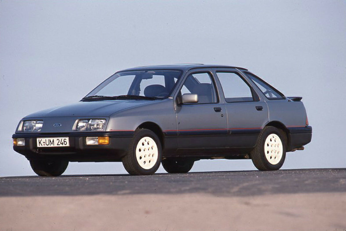 This archival image documents the 1985 Ford Sierra 2.0 IS LHD with scneic blue sky and is preserved in the Ford Heritage Vault as part of Ford Motor Company's historic photographic archive. Free for personal, non-commercial use. Ford Heritage Vaul...