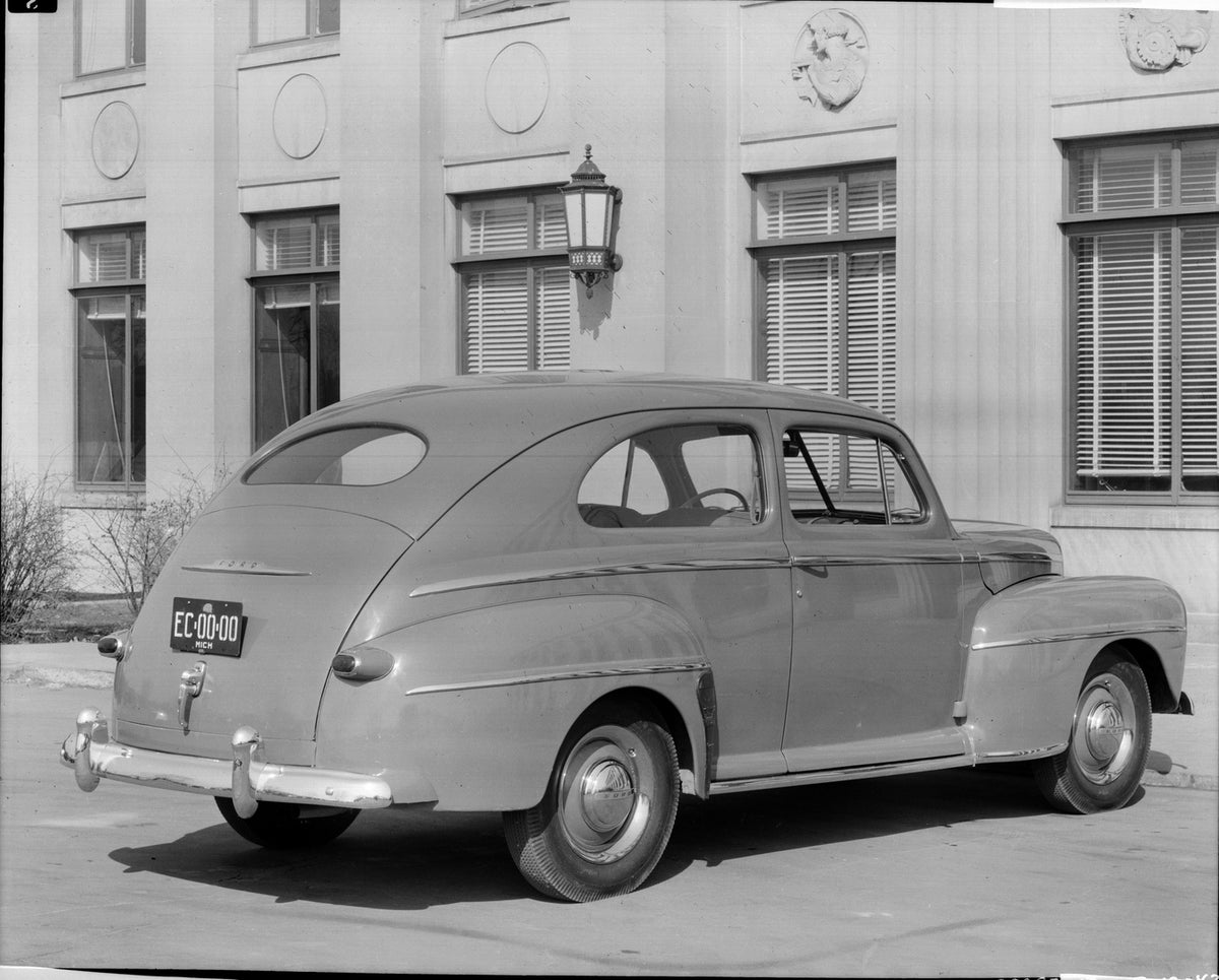 This archival image documents the 1947 Ford Super Deluxe tudor sedan outside Ford Engineering Laboratory and is preserved in the Ford Heritage Vault as part of Ford Motor Company's historic photographic archive. Free for personal, non-commercial u...