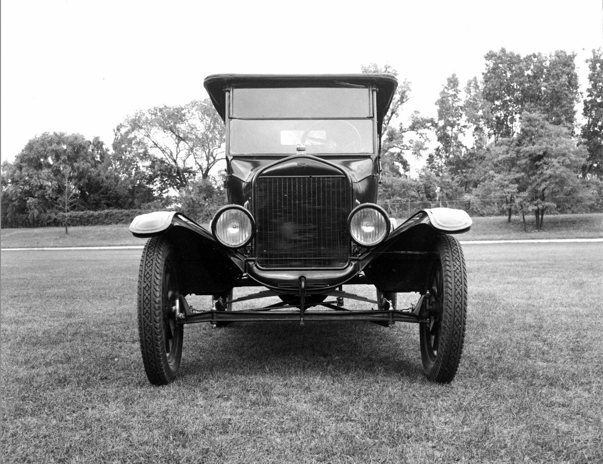 This archival image documents the 1922 Ford Model T Touring Car and is preserved in the Ford Heritage Vault as part of Ford Motor Company's historic photographic archive. Free for personal, non-commercial use. Ford Heritage Vault reference AR-2008...